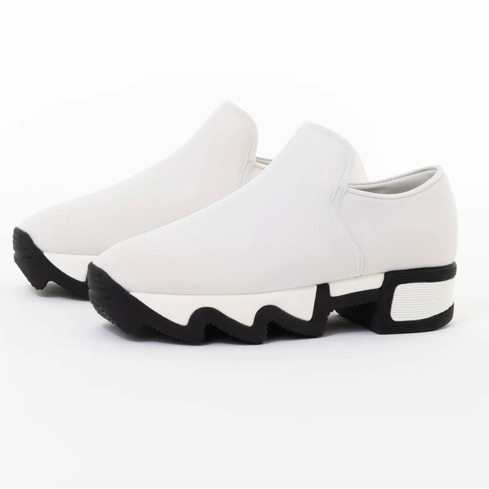 IRI Women’s White Slip-On Sneakers with Chunky Black Sole